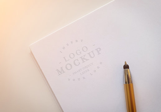 Debossed Logo on Paper Stack Mockup