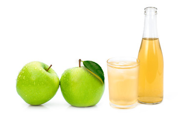 Fototapeta na wymiar Closeup bottle and glass of apple cider vinegar and green granny smith apples isolated on white background.