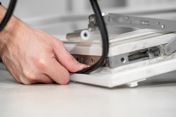 Professional master at repair and installation of windows, changes rubber seal gasket in pvc windows