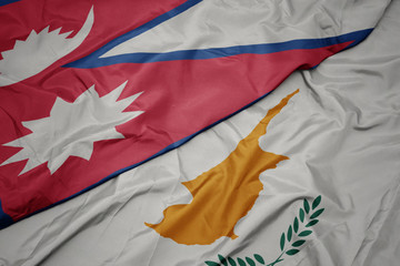Naklejka na ściany i meble waving colorful flag of cyprus and national flag of nepal.