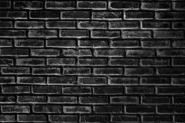 Black brick wall stacked texture background