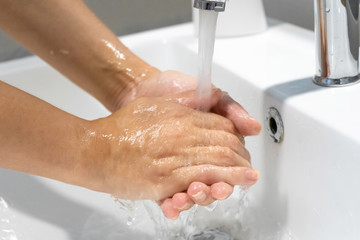 Washing hands rubbing with soap woman for corona virus prevention, hygiene to stop spreading...