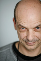 mature man looking at camera