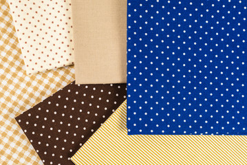 Mix of beige, white and brown cotton fabric.