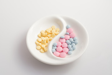 small plate with various narcotic pills