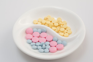 small plate with various narcotic pills