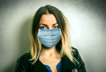 Girl closeup with the protective mask
