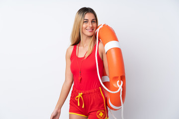 Lifeguard woman over isolated white background smiling a lot © luismolinero