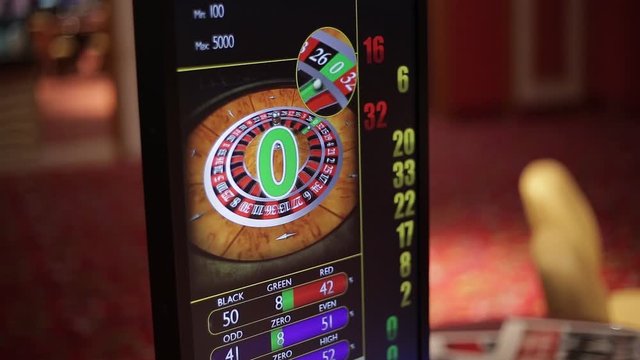 The rotation of the roulette casino. The video shows a hand throwing a ball on a wheel and spinning it. With the movement of the camera.