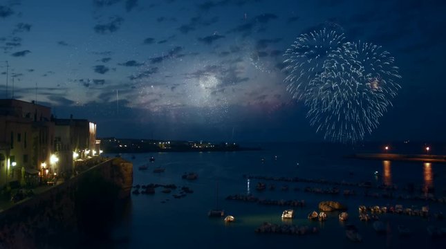 Cinemagraph. Fireworks and night view of seaport at Otranto, southern Italy