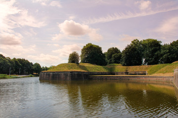Naarden, Netherlands - Sunset with lake and trees