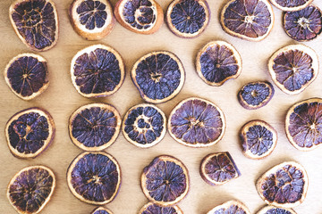 Dried oranges on the brown background