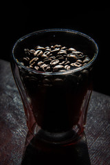 roasted coffee beans in a glass for breakfast