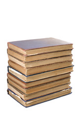 Old books are isolated on a white background. Close-up.