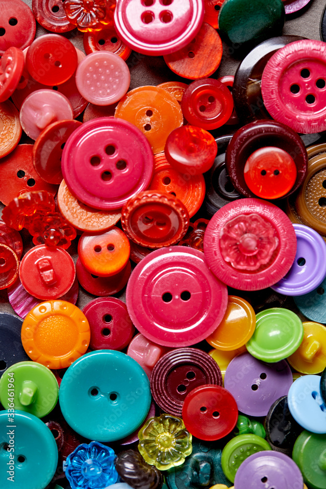Poster Background and texture of multicolored antique buttons