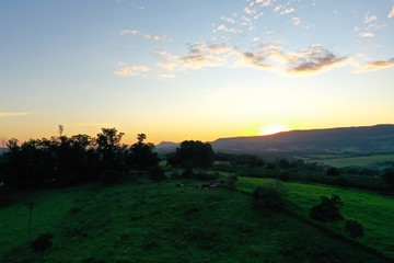 Obraz premium Panoramic view of sunset in the rural life. Great landscape.