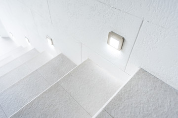 White minimalistic stairs with led lights