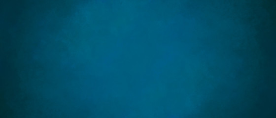Blue grunge marbled texture banner with space for text. Concentrated focus in the center