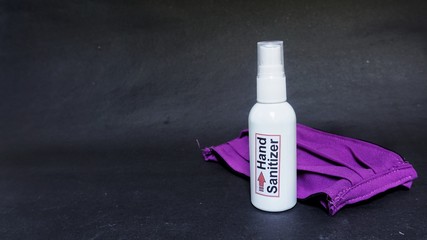 hand sanitizer and mouth mask