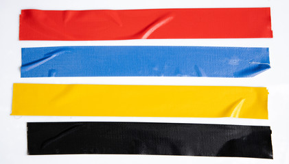 Set of yellow, green, black tapes on white background. Torn horizontal and different size sticky...