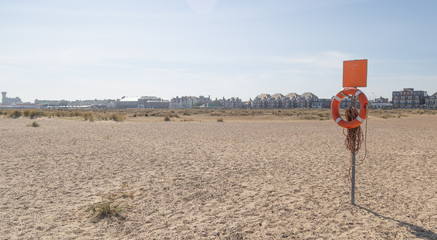 Life buoy on the beach