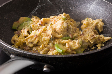 Scrambled eggs with garlic, zucchini, and shrimp. Cooking steps