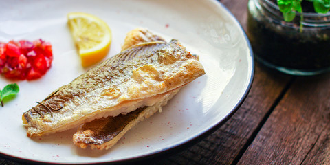 Fried fish fillet hake, seafood main course pescatarian
Menu concept. food background. top view copy space for text keto or paleo diet