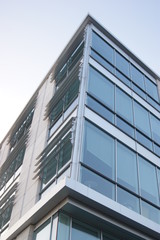 Obraz premium modern office building with glass windows
