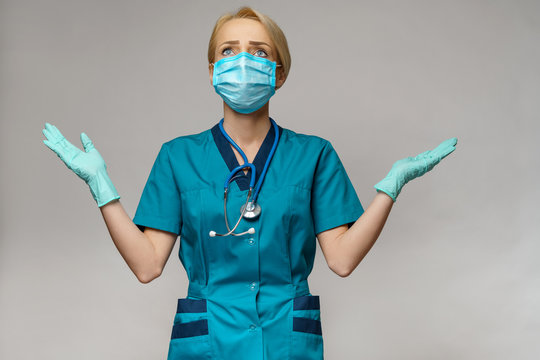 medical doctor nurse woman wearing protective mask and latex gloves - lack of mind gesture