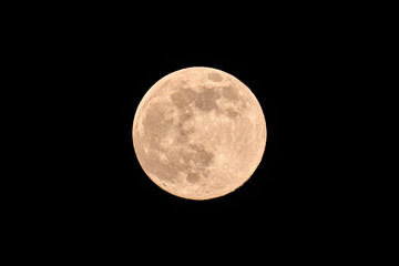 full moon isolated on night sky background Natural color of earth satellite Black dark sky at...