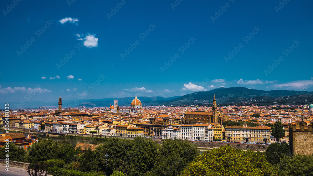 Wall mural beautiful aerial landscape of the city of florence, italy with various houses and church at sunset