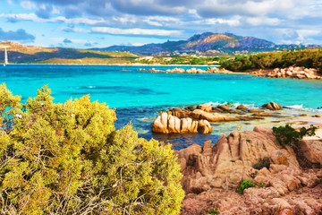Sunrise and Rocks on Capriccioli Beach in Sardinia