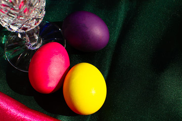 Painted Easter eggs in a nest of straw. Sunlight. Easter still life. - 336482980