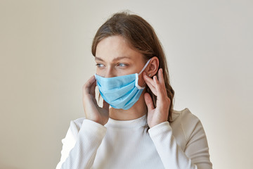 Girl in blue medical mask