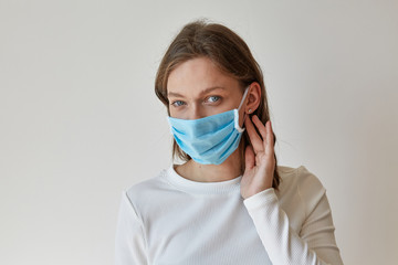Girl in blue medical mask