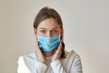 Girl in blue medical mask