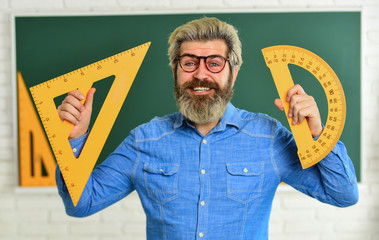 Good news. formal sciences. happy mature teacher in glasses. back to school. man engineering...
