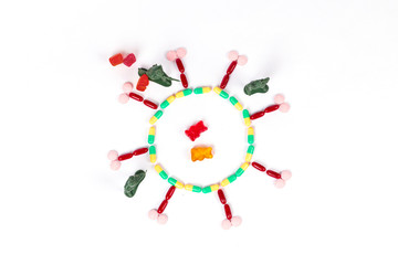 Army soldiers  atacking coronavirus made of pills. Civilian 
gummy bears prisoners 