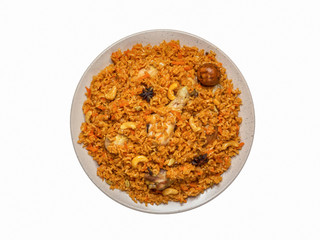 Isolated homemade chicken Biryani. Arabic traditional food bowls Kabsa with meat