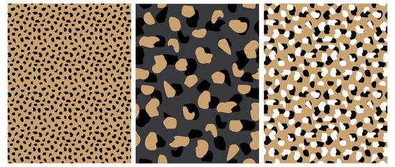Abstract Leopard Skin Seamless Vector Patterns. White, Brown and Black Irregular Brush Spots on a Gray and Gold Backgrounds. Abstract Wild Animal Skin Print. Simple Irregular Geometric Design.