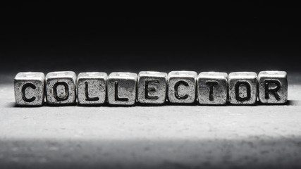 Inscription collector on metal cubes in grunge style on a black background isolated