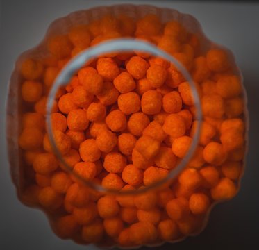 food orange macro cheese balls organic close-up dry container