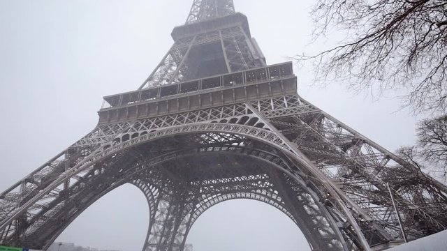 Eiffel Tower in winter with snow in Paris France