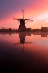 windmills at sunset
