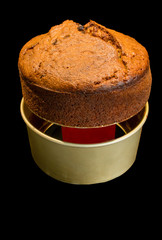 Removing home made banana bread fro its baking container