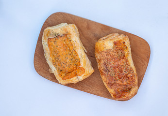 Two cheese and bacon croissants