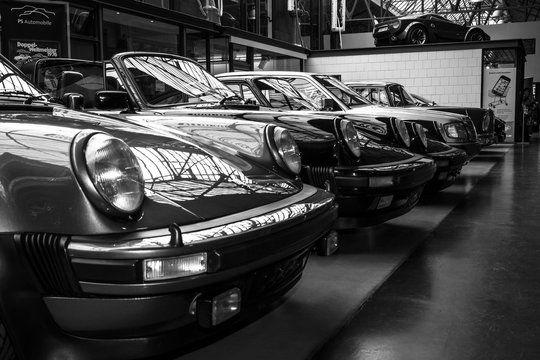 BERLIN, GERMANY - MAY 17, 2014: Various oldtimers 60-70s standing in a row. Black and white. 27th Oldtimer Day Berlin - Brandenburg