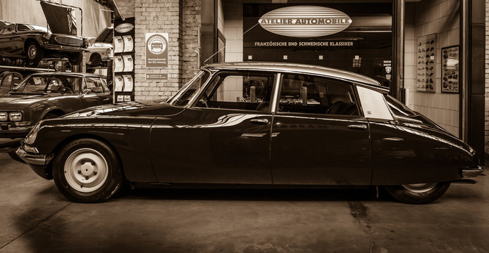 BERLIN, GERMANY - MAY 17, 2014: Mid-size luxury car Citroen DS 18. Sepia. 27th Oldtimer Day Berlin - Brandenburg