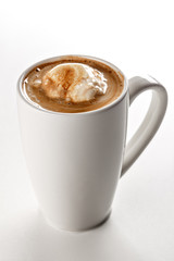 Delicious frappuccino coffee in white ceramic mug. White background. Highest quality of coffee ground. Content for coffee addicted guys