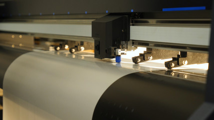 Industrial worker input data programing for CNC milling machine.